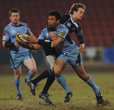 19.02.10 - Glasgow v Cardiff Blues - Magners League - Casey Laulala of Cardiff Blues is tackled by Ruaridh Jackson of Glasgow. 