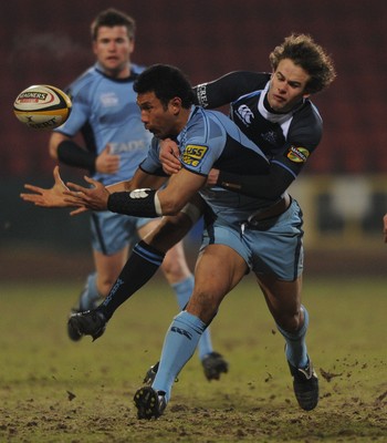 19.02.10 - Glasgow v Cardiff Blues - Magners League - Casey Laulala of Cardiff Blues is tackled by Ruaridh Jackson of Glasgow. 