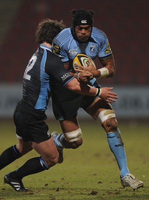 19.02.10 - Glasgow v Cardiff Blues - Magners League - Maama Molitika of Cardiff Blues is tackled by Peter Horne of Glasgow. 