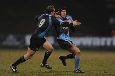 19.02.10 - Glasgow v Cardiff Blues - Magners League - Tom James of Cardiff Blues is tackled by Mark McMillan of Glasgow. 