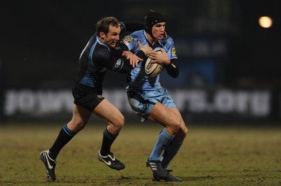 19.02.10 - Glasgow v Cardiff Blues - Magners League - Tom James of Cardiff Blues is tackled by Mark McMillan of Glasgow. 