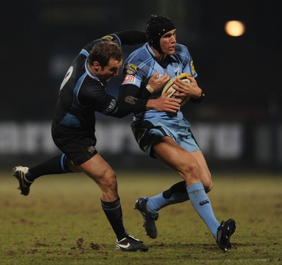 19.02.10 - Glasgow v Cardiff Blues - Magners League - Tom James of Cardiff Blues is tackled by Mark McMillan of Glasgow. 