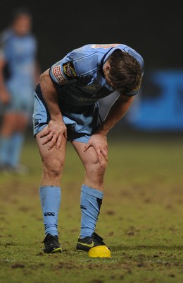 19.02.10 - Glasgow v Cardiff Blues - Magners League - Ben Blair of Cardiff Blues holds his leg after a kick at goal. 