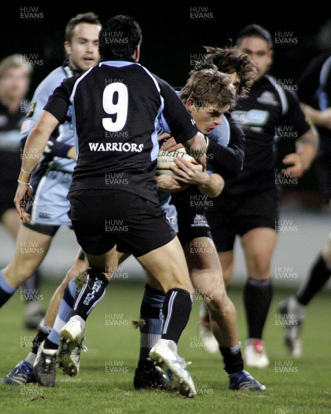 23/11/07: Glasgow Warriors v Cardiff Blues in the Magners League; Ben Blair of Cardiff tackled by (9) Chris O'Young and Bernardo Stortoni of Glasgow. 