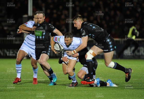 231118 - Glasgow Warriors v Cardiff Blues - Cardiff Blues' Jarrod Evans is tackled by Glasgow's Stafford McDowall � Huw Evans Agency