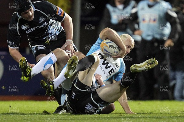 28.10.11 - Glasgow v Ospreys - RaboDirect Pro 12 Ospreys' Richard Fussell (R) is brought down by Glasgow Warriors' Tommy Seymour (L) 