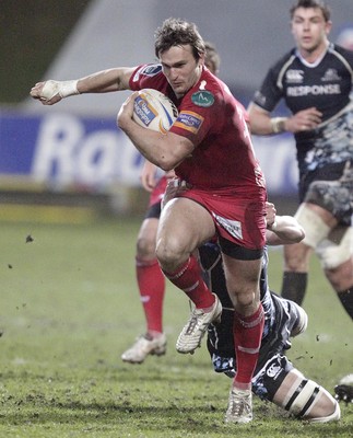 090212 - Glasgow Warriors v Scarlets - RaboDirect Pro 12Glasgow Warriors' Callum Forrester tackles Scarlets' Andy Fenby