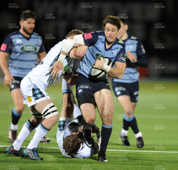 011217 - Glasgow Warriors v Cardiff Blues - Guinness PRO14 -  Blaine Scully of Cardiff crashes through the tackle of Glasgow fly half Peter Horne