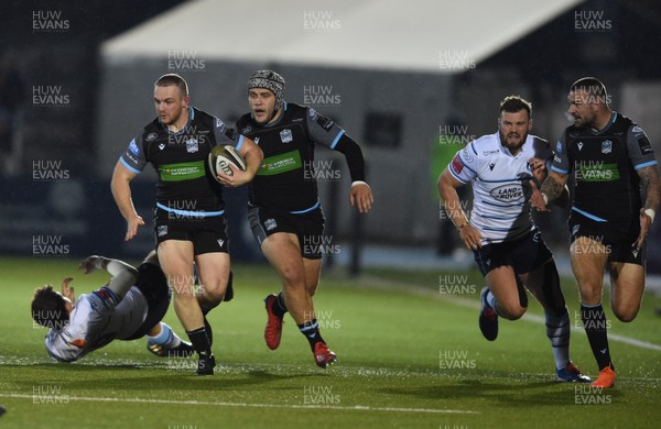 121019 - Glasgow Warriors v Cardiff Blues - Guinness PRO14 -  Nick Grigg of Glasgow tackled by Lloyd Williams of Cardiff