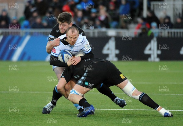 120119 - Glasgow Warriors v Cardiff Blues - Guinness PRO14 -  Dan Fish of Cardiff gets crunch tackled by Oli Kebble and Scott Cummings