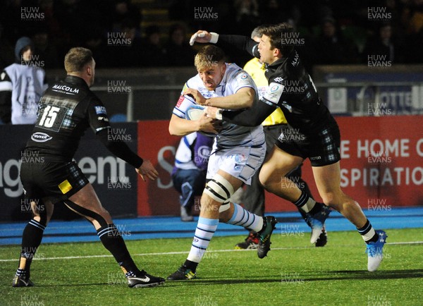 120119 - Glasgow Warriors v Cardiff Blues - Guinness PRO14 -  Macauley Cook of Cardiff is hauled down by DTH van der Merwe