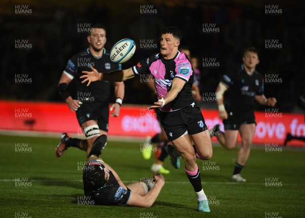 220324 - Glasgow Warriors v Cardiff Rugby - United Rugby Championship - Ellis Bevan of Cardiff Rugby  scrum half juggles the ball before giving a try pass to Ben Thomas of Cardiff Rugby centre (unseen)