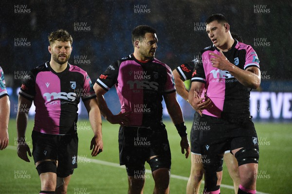 220324 - Glasgow Warriors v Cardiff Rugby - United Rugby Championship - Cardiff Rugby players leave the field dejected following a 17-13 defeat to the home side