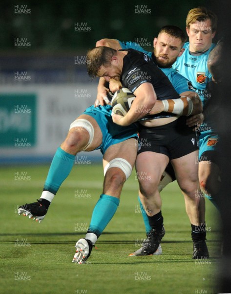 051220 - Glasgow Warriors v Dragons - Guinness PRO14 - Nick Grigg of Glasgow Warriors is tackled by Harri Keddie of Dragons