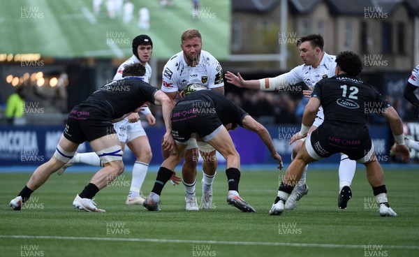 010423 - Glasgow Warriors v Dragons RFC - EPCR Challenge Cup - Ross Moriarty of Dragons is tackled
