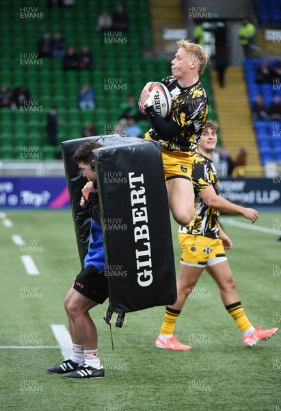 111025 - Glasgow Warriors v Dragons RFC - United Rugby Championship - Dragons players during the warm up