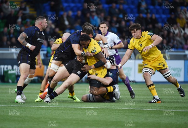 111025 - Glasgow Warriors v Dragons RFC - United Rugby Championship - Levi Douglas of Dragons barges through the tackle of Alex Craig of Glasgow Warriors
