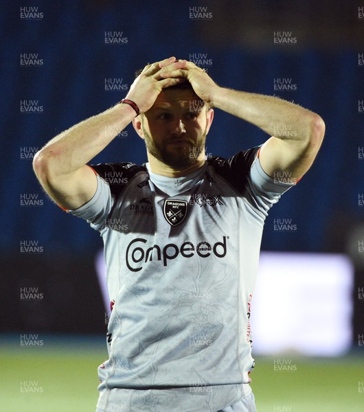 170224 - Glasgow Warriors v Dragons RFC - United Rugby Championship - Steff Hughes of Dragons stands dejected at the end of the game following defeat