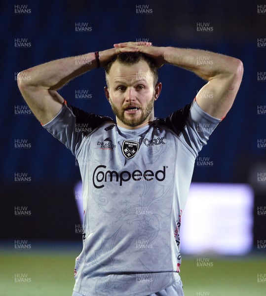 170224 - Glasgow Warriors v Dragons RFC - United Rugby Championship - Steff Hughes of Dragons stands dejected at the end of the game following defeat