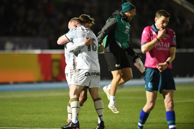 010325 - Glasgow Warriors v Ospreys - United Rugby Championship - Keelan Giles of Ospreys celebrates with Ethan Lewis of Ospreys after racing over the line to score a first half try in the corner