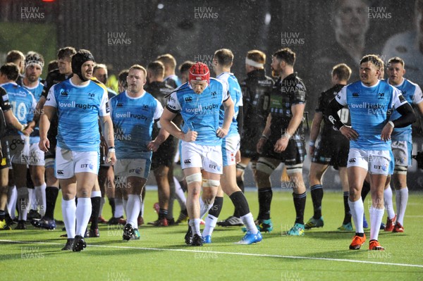 250119 - Glasgow Warriors v Ospreys - Guinness PRO14 -  Ospreys players leave the field dejected at full time following a 9-3 defeat to the home team