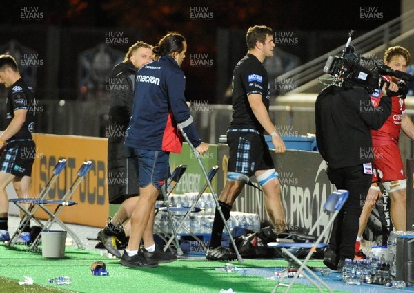 111020 - Glasgow Warriors v Scarlets - Guinness PRO14 - Josh MacLeod of Scarlets leaves the field on crutches at the end of the match