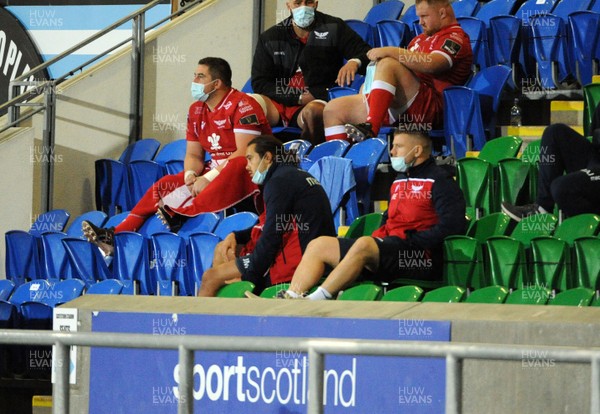 111020 - Glasgow Warriors v Scarlets - Guinness PRO14 - Josh MacLeod of Scarlets sits in the stand after being forced off injured in the first half