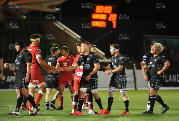 111020 - Glasgow Warriors v Scarlets - Guinness PRO14 - Lewis Rawlins of Scarlets shakes hands with Matt Fagerson at the final whistle following a 20-7 defeat to Glasgow
