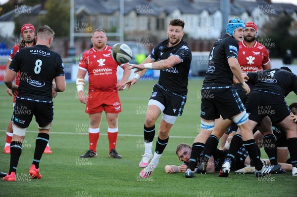 111020 - Glasgow Warriors v Scarlets - Guinness PRO14 - Ali Price of Glasgow Warriors fires out a pass