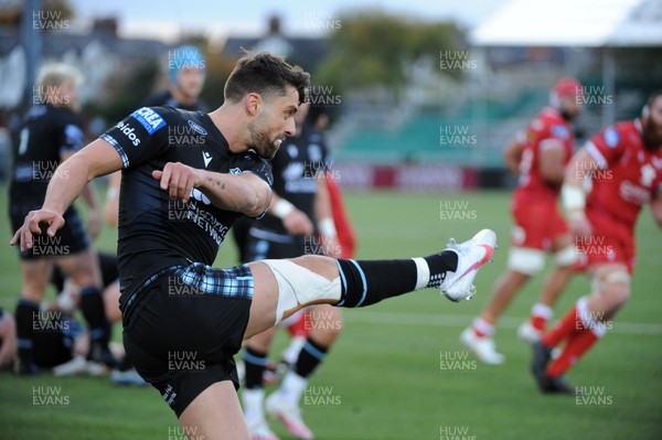 111020 - Glasgow Warriors v Scarlets - Guinness PRO14 - Adam Hastings of Glasgow puts in a clearance kick