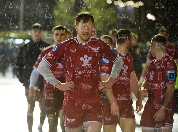 140423 - Glasgow Warriors v Scarlets - United Rugby Championship - Rhys Patchell of Scarlets leaves the field dejected