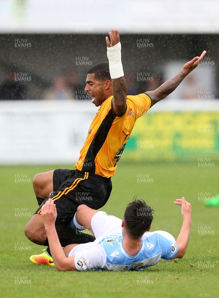 220717 - Gloucester City v Newport County - Pre Season Friendly - Joss Labadie of Newport County is tackled by Joe Hanks of Gloucester