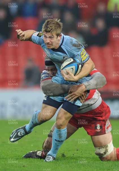 08.11.09 - Gloucester v Cardiff Blues - LV= Cup - Richard Mustoe of Cardiff Blues is tackled by Dave Attwood of Gloucester. 