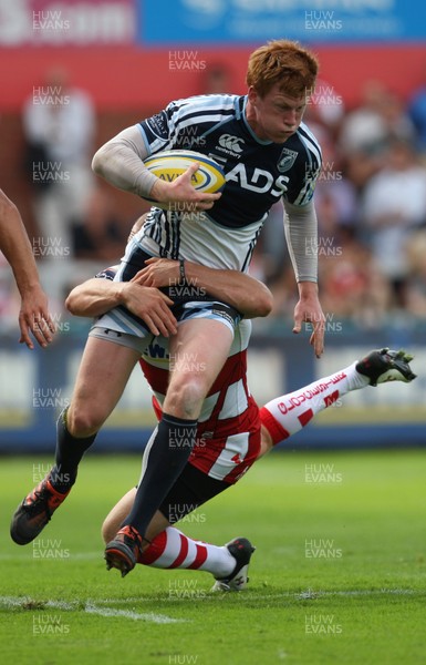 180812 - Gloucester Rugby v Cardiff Blues, Pre-season Friendly - Cardiff Blues Rhys Patchell is tackled by Gloucester's Mike Tindall 