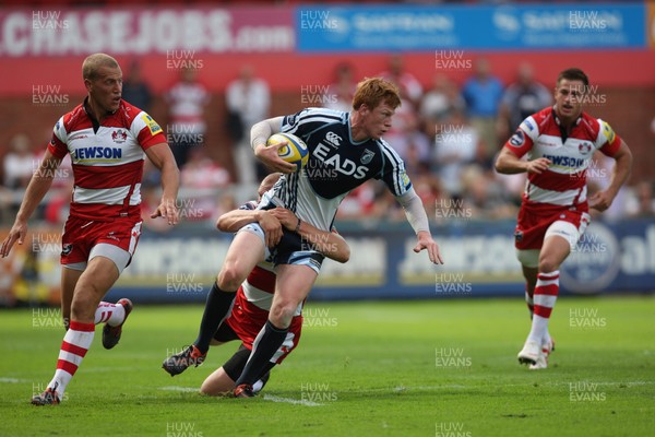 180812 - Gloucester Rugby v Cardiff Blues, Pre-season Friendly - Cardiff Blues Rhys Patchell is tackled by Gloucester's Mike Tindall 