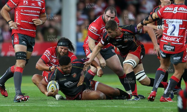 230818 - Gloucester Rugby v Dragons - Pre Season Friendly - Leon Brown of Dragons is tackled by Josh Hohneck of Gloucester