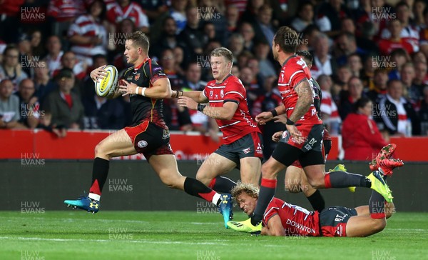 230818 - Gloucester Rugby v Dragons - Pre Season Friendly - Hallam Amos of Dragons breaks away from Billy Twelvetrees of Gloucester