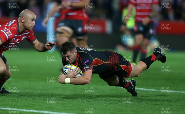 230818 - Gloucester Rugby v Dragons - Pre Season Friendly - Josh Lewis of Dragons breaks through to score a try