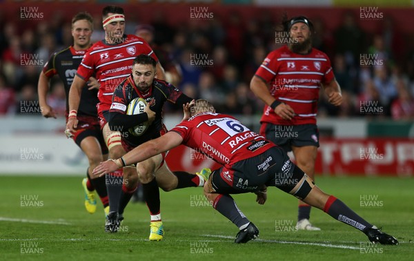 230818 - Gloucester Rugby v Dragons - Pre Season Friendly - Jordan Williams of Dragons is tackled by Ruan Ackermann of Gloucester