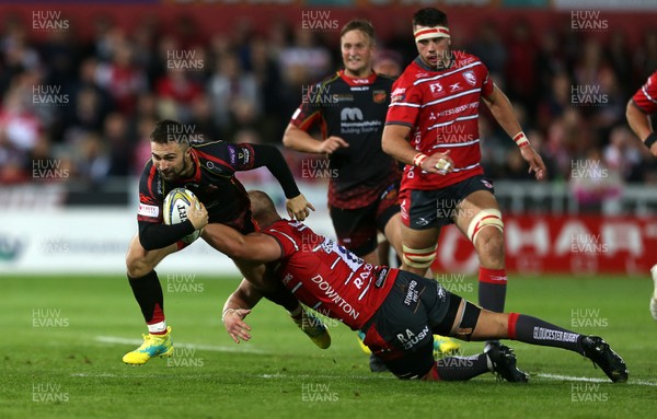 230818 - Gloucester Rugby v Dragons - Pre Season Friendly - Jordan Williams of Dragons is tackled by Ruan Ackermann of Gloucester