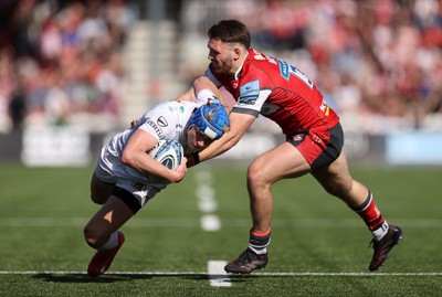 270425 - Gloucester Rugby v Exeter Chiefs - Premiership - Josh Hodge of Exeter Chiefs is tackled by Chris Harris of Gloucester 