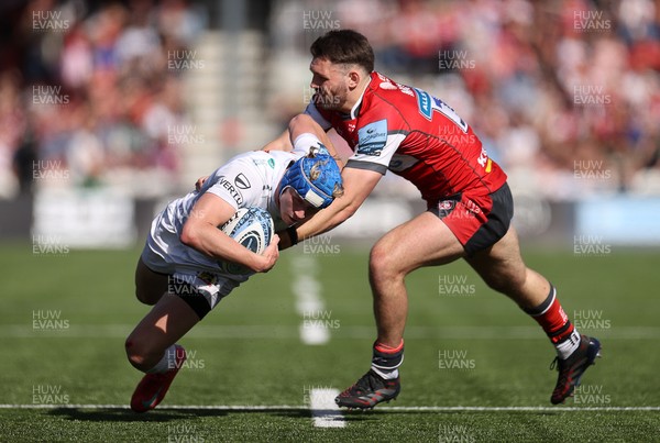 270425 - Gloucester Rugby v Exeter Chiefs - Premiership - Josh Hodge of Exeter Chiefs is tackled by Chris Harris of Gloucester 