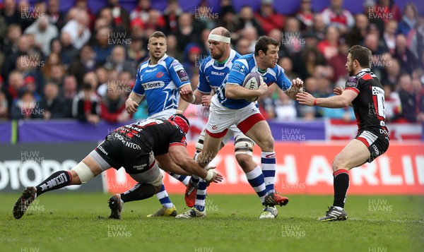 090416 - Gloucester v Newport Gwent Dragons - European Rugby Challenge Cup Quarter Final - Adam Warren of Newport Gwent Dragons is tackled by Sione Kalafamoni and Greig Laidlaw of Gloucester