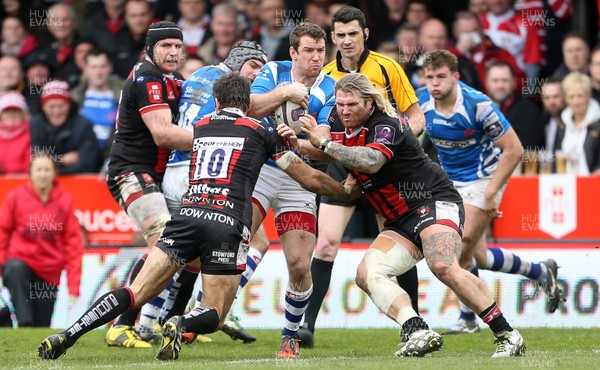 090416 - Gloucester v Newport Gwent Dragons - European Rugby Challenge Cup Quarter Final - Adam Warren of Newport Gwent Dragons is tackled by James Hook and Richard Hibbard of Gloucester