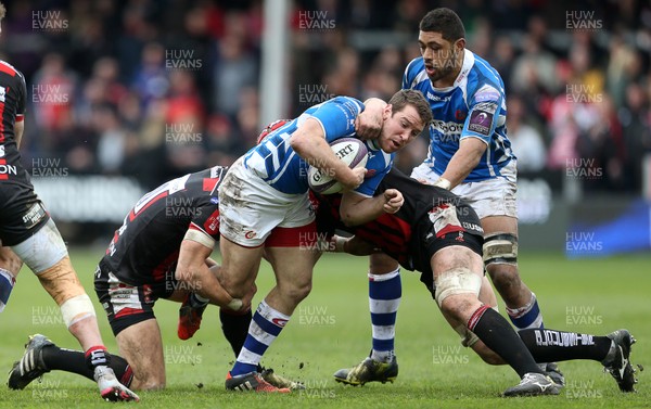 090416 - Gloucester v Newport Gwent Dragons - European Rugby Challenge Cup Quarter Final - Adam Warren of Newport Gwent Dragons is tackled by James Hook and Tom Savage of Gloucester