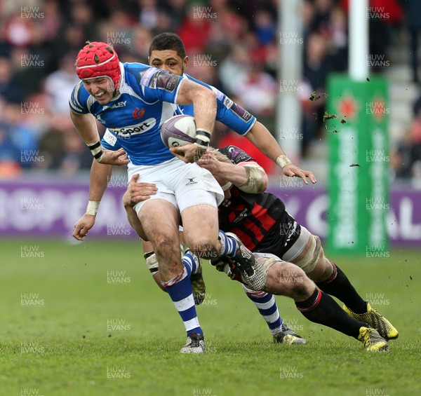 090416 - Gloucester v Newport Gwent Dragons - European Rugby Challenge Cup Quarter Final - Tyler Morgan of Newport Gwent Dragons is tackled by Matt Kvesic of Gloucester