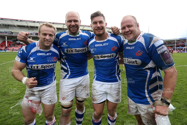 090416 - Gloucester v Newport Gwent Dragons - European Rugby Challenge Cup Quarter Final - Sarel Pretoriuse, Rynard Landman, Carl Meyer and Brok Harris of Newport Gwent Dragons celebrate the win at full time