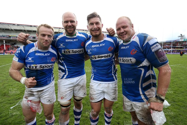 090416 - Gloucester v Newport Gwent Dragons - European Rugby Challenge Cup Quarter Final - Sarel Pretoriuse, Rynard Landman, Carl Meyer and Brok Harris of Newport Gwent Dragons celebrate the win at full time