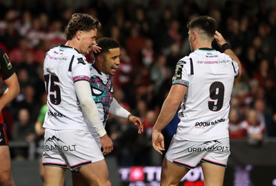 120424 - Gloucester v Ospreys - European Challenge Cup Quarter Final - Keelan Giles of Ospreys celebrates scoring a try with team mates