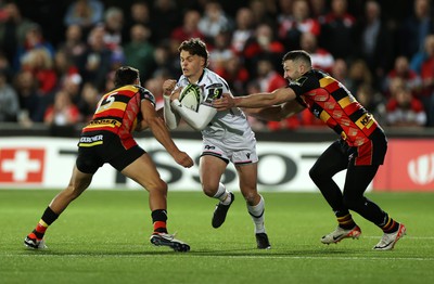 120424 - Gloucester v Ospreys - European Challenge Cup Quarter Final - Jack Walsh of Ospreys is tackled by Santi Carreras and Jonny May of Gloucester 